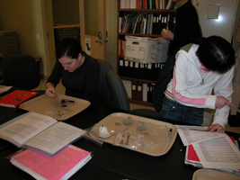 Cataloging Megan and Jessica cataloging.