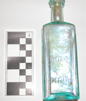 Lyons Lyon's Kathairon hair tonic bottle, embossed “For The Hair”